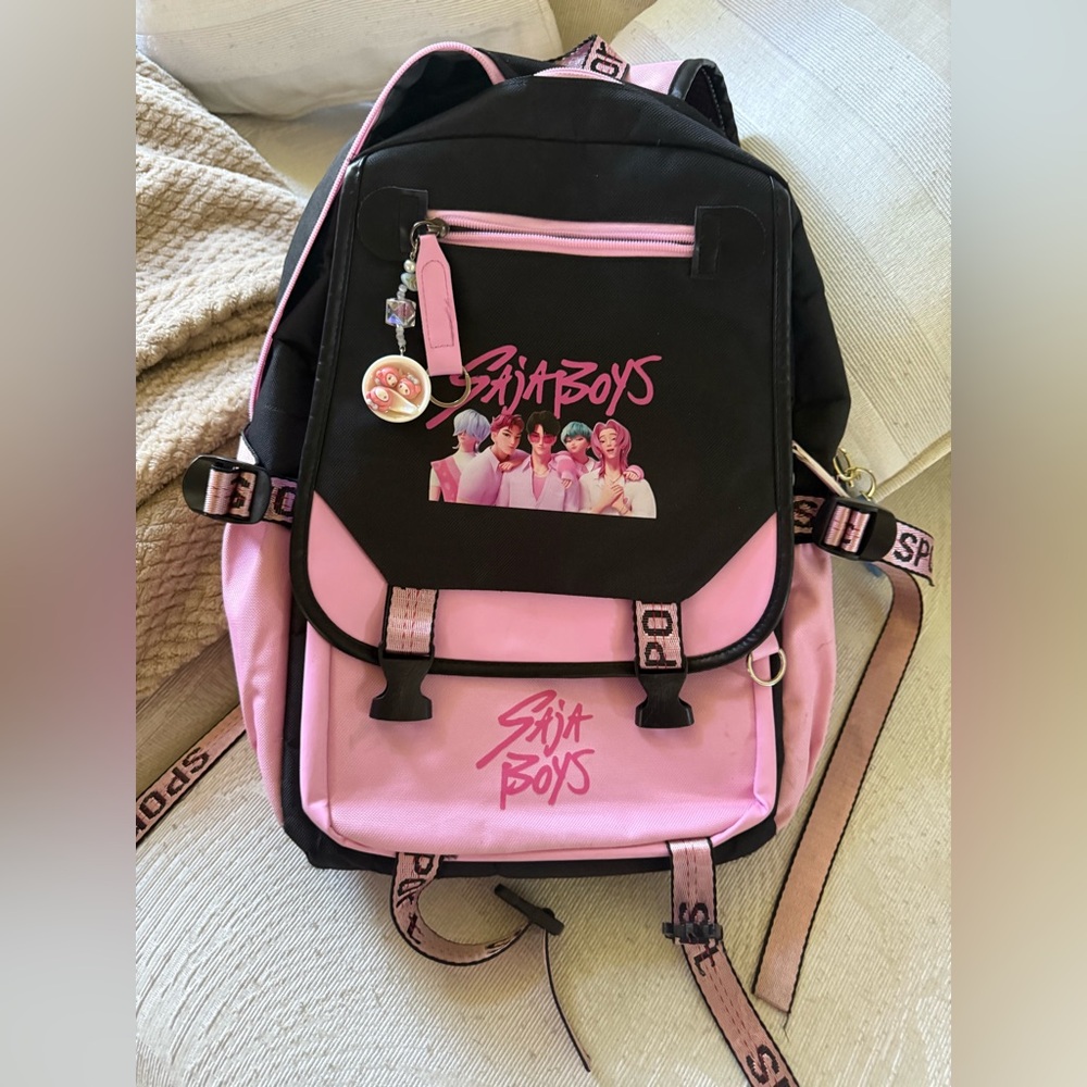 Saja boys ( huntrixx ) pink and Black Backpack with Graphic Design